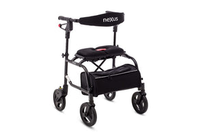 Black NeXus Mobility Walker standing folded with storage bag attached
