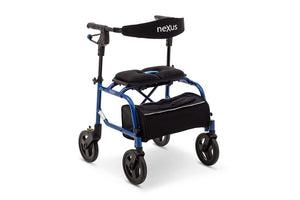 Blue NeXus Mobility Walker standing folded with storage bag attached