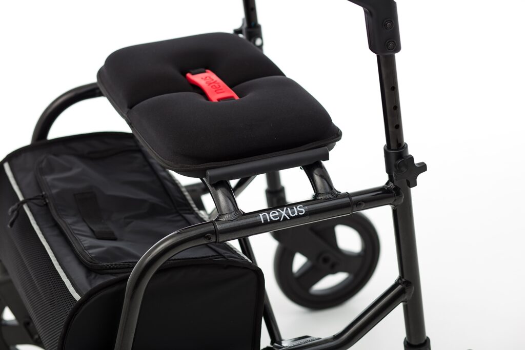 Padded seat and flip-up backrest on NeXus Mobility Walker