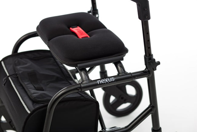 Padded seat and flip-up backrest on NeXus Mobility Walker