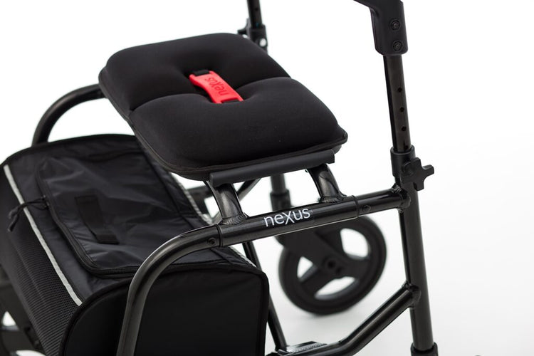 Padded seat and flip-up backrest on NeXus Mobility Walker